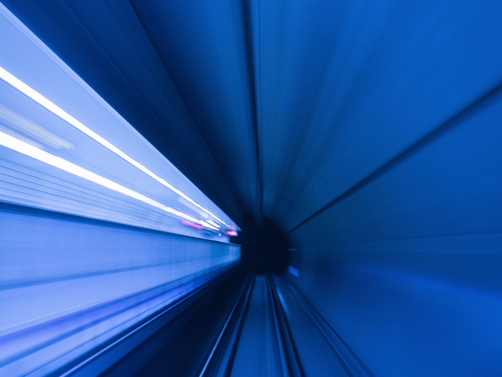 Abstract blue light tunnel representing connected advertising surfaces